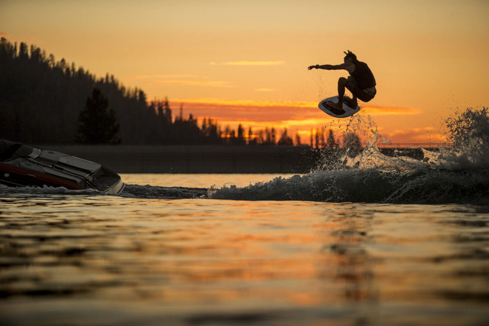 A person on a surfboard in the water.