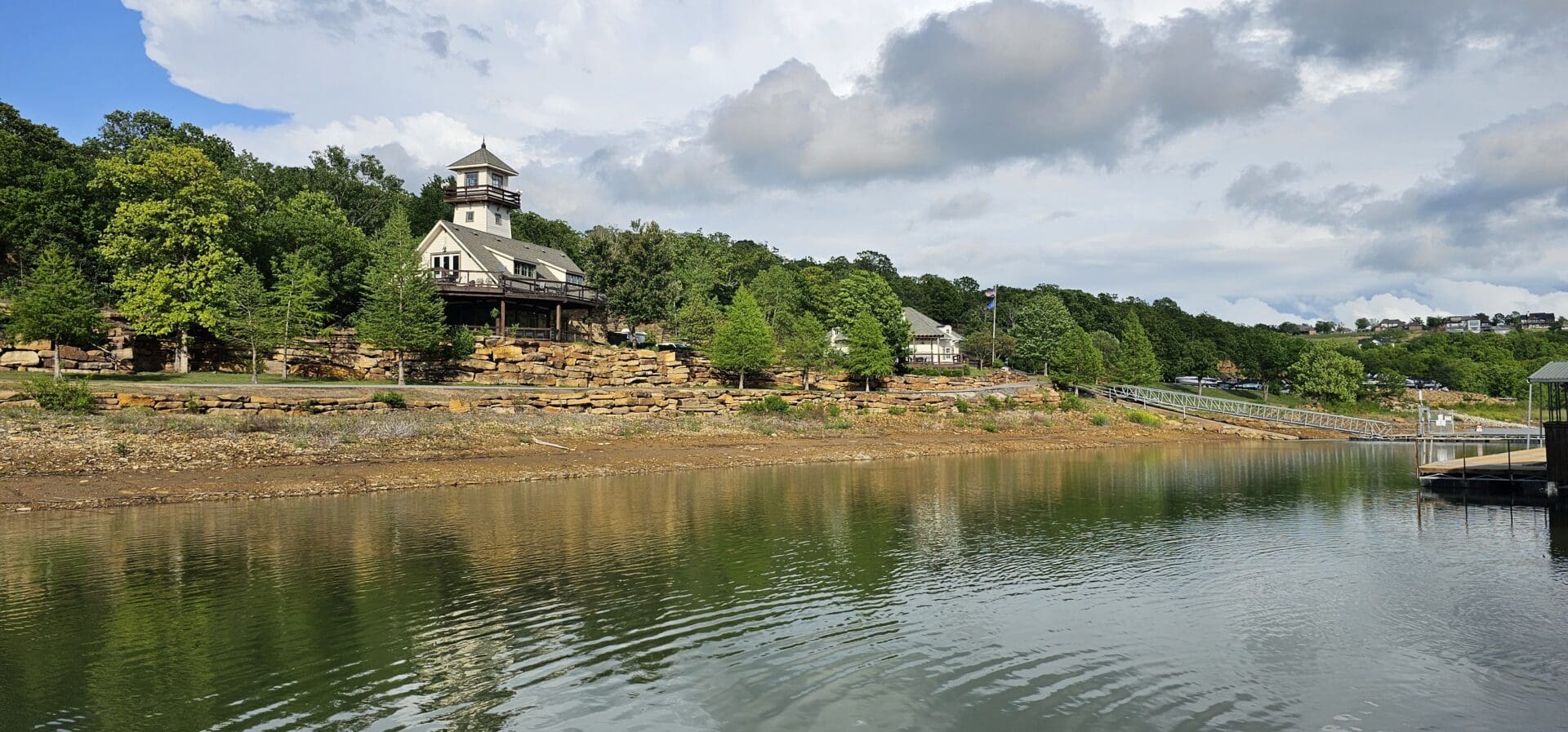 A lake with houses on the side of it